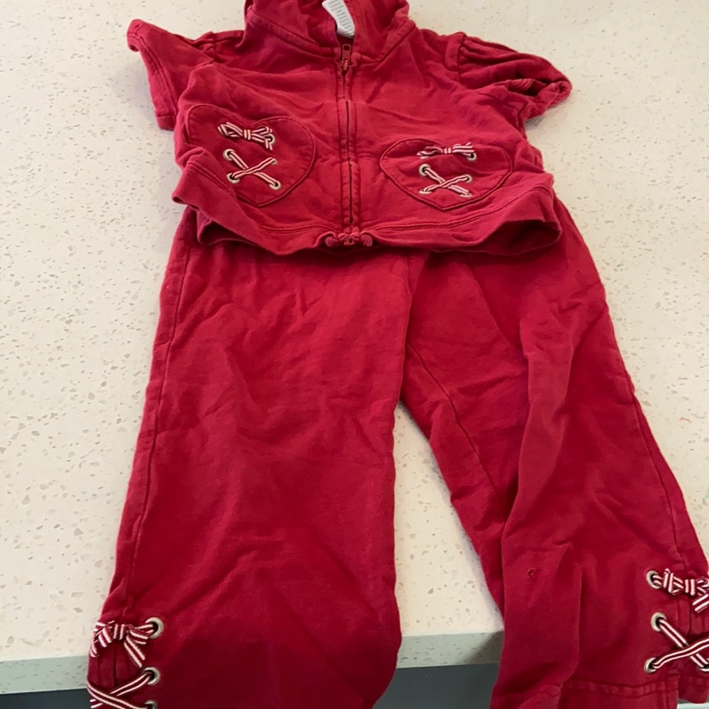 Short sleeve zip up jacket with pants.